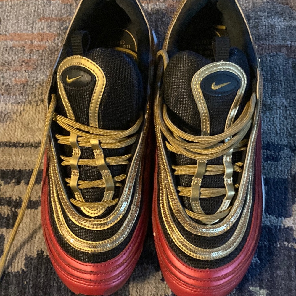 RED BLACK AND GOLD NIKES